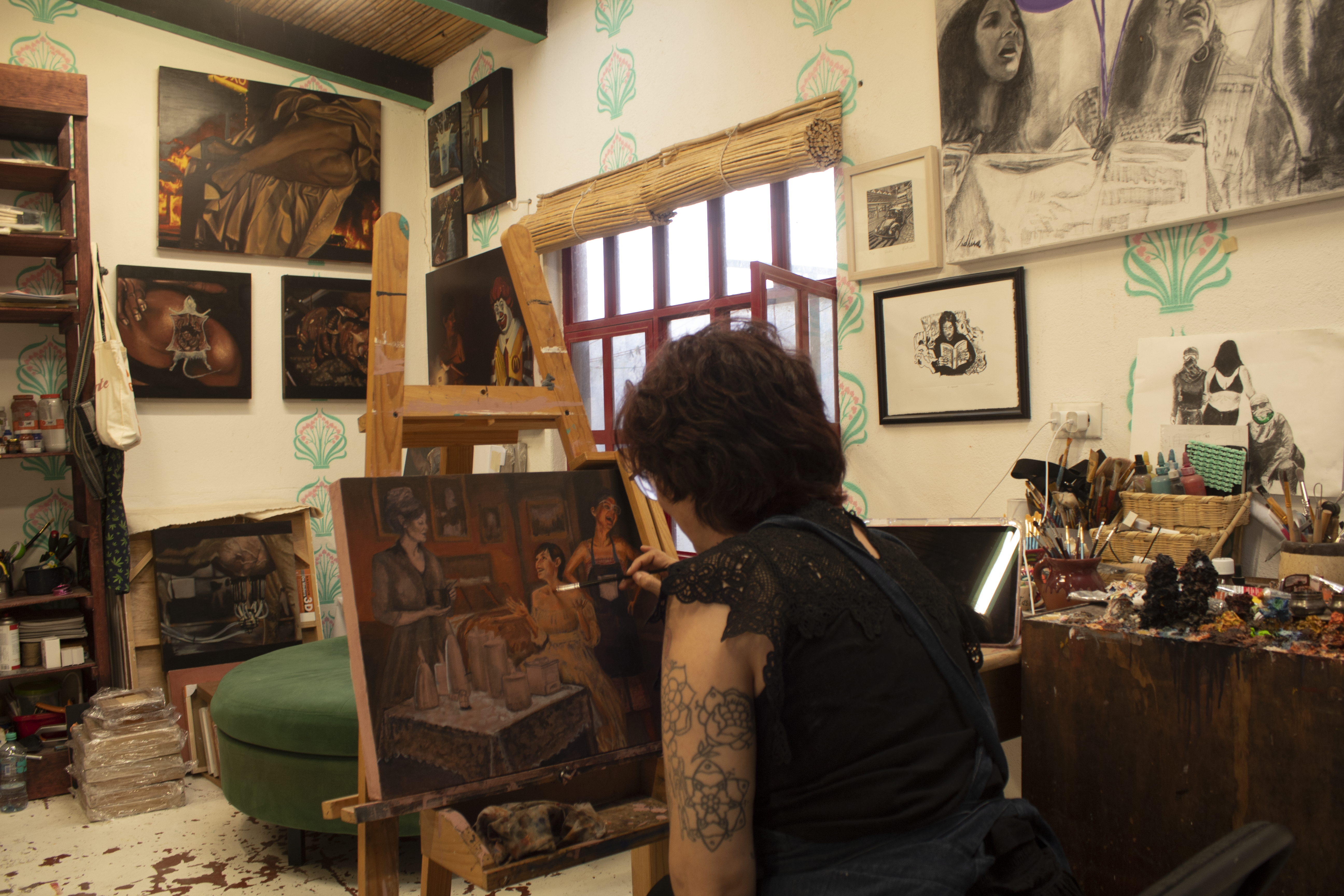 Indhira painting in her studio
