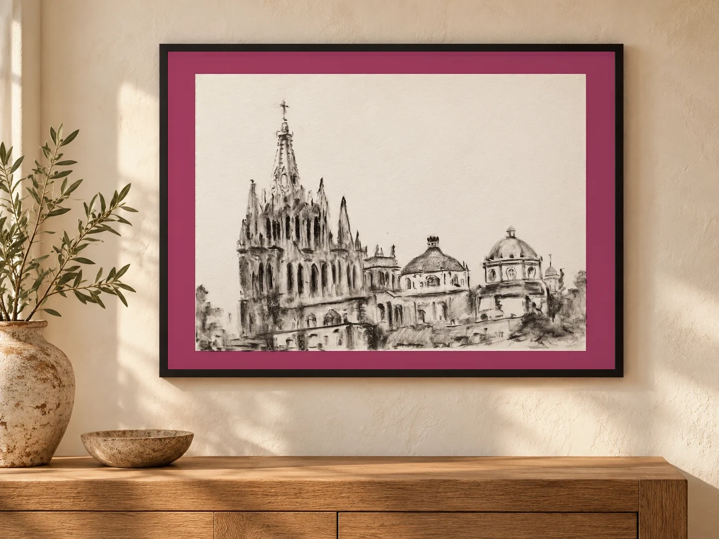 Charcoal panorama of the parish in San Miguel, shown with a fuchsia mat